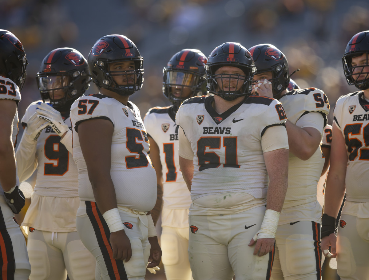 Nov 19, 2022; Tempe, Arizona, USA; Oregon State Beavers offensive lineman Dylan Lopez (57) and Tanner Miller (61) against the Arizona State Sun Devils at Sun Devil Stadium. Mandatory Credit: Mark J. Rebilas-USA TODAY Sports